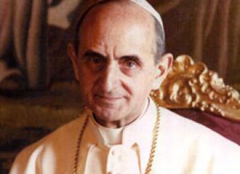 formal photograph of Pope Paul VI in white robe and zucchetto and elaborate red-and-gold chair.  The expression of his face is kind and humble